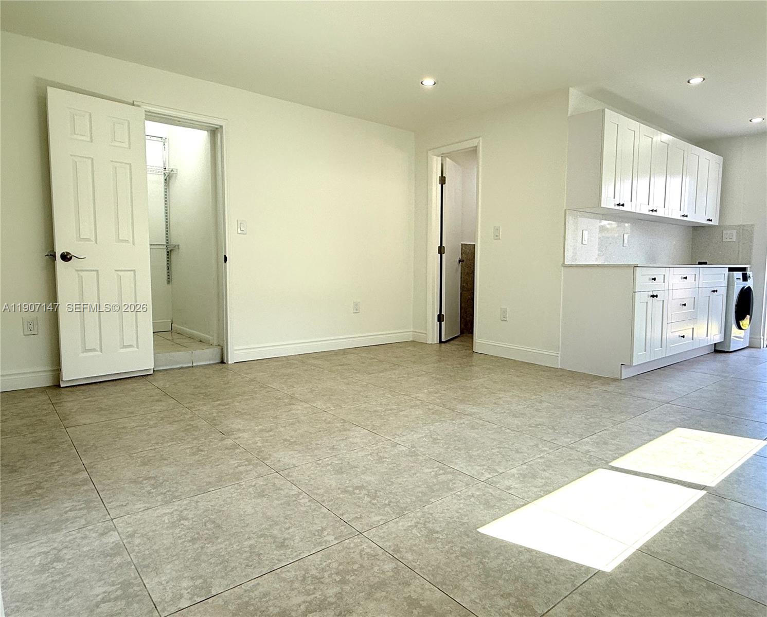 10040 Southwest 198th Street Cutler Bay, FL 33157 - Photo 10 of 13 a view of an empty room