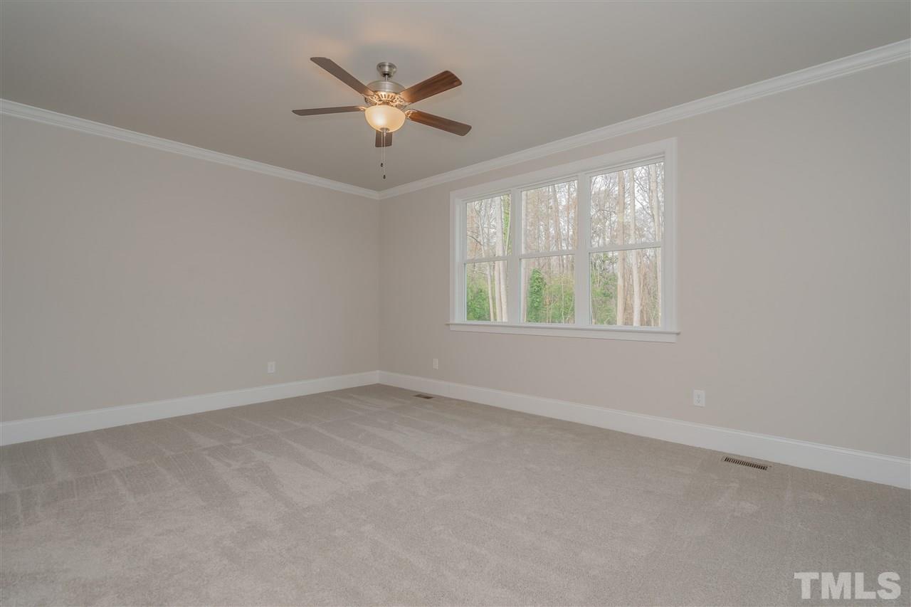 3911 Sue Lane Raleigh, NC 27604 - Photo 17 of 25 an empty room with a window