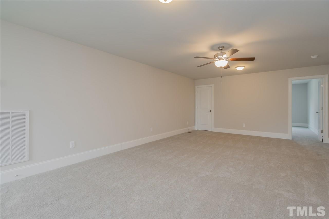3911 Sue Lane Raleigh, NC 27604 - Photo 20 of 25 a view of an empty room with a bathroom