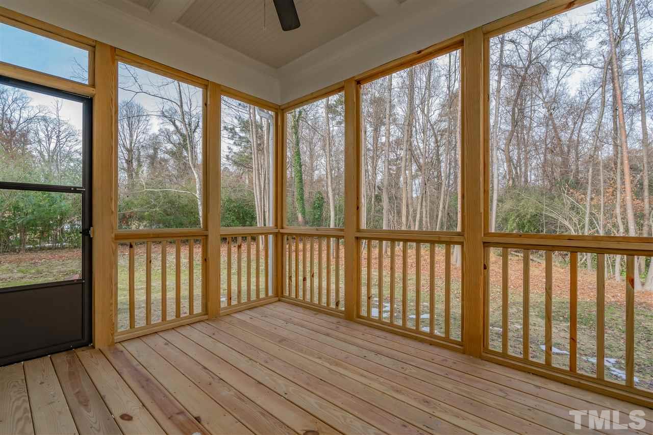 3911 Sue Lane Raleigh, NC 27604 - Photo 22 of 25 a view of hallway with wooden floor