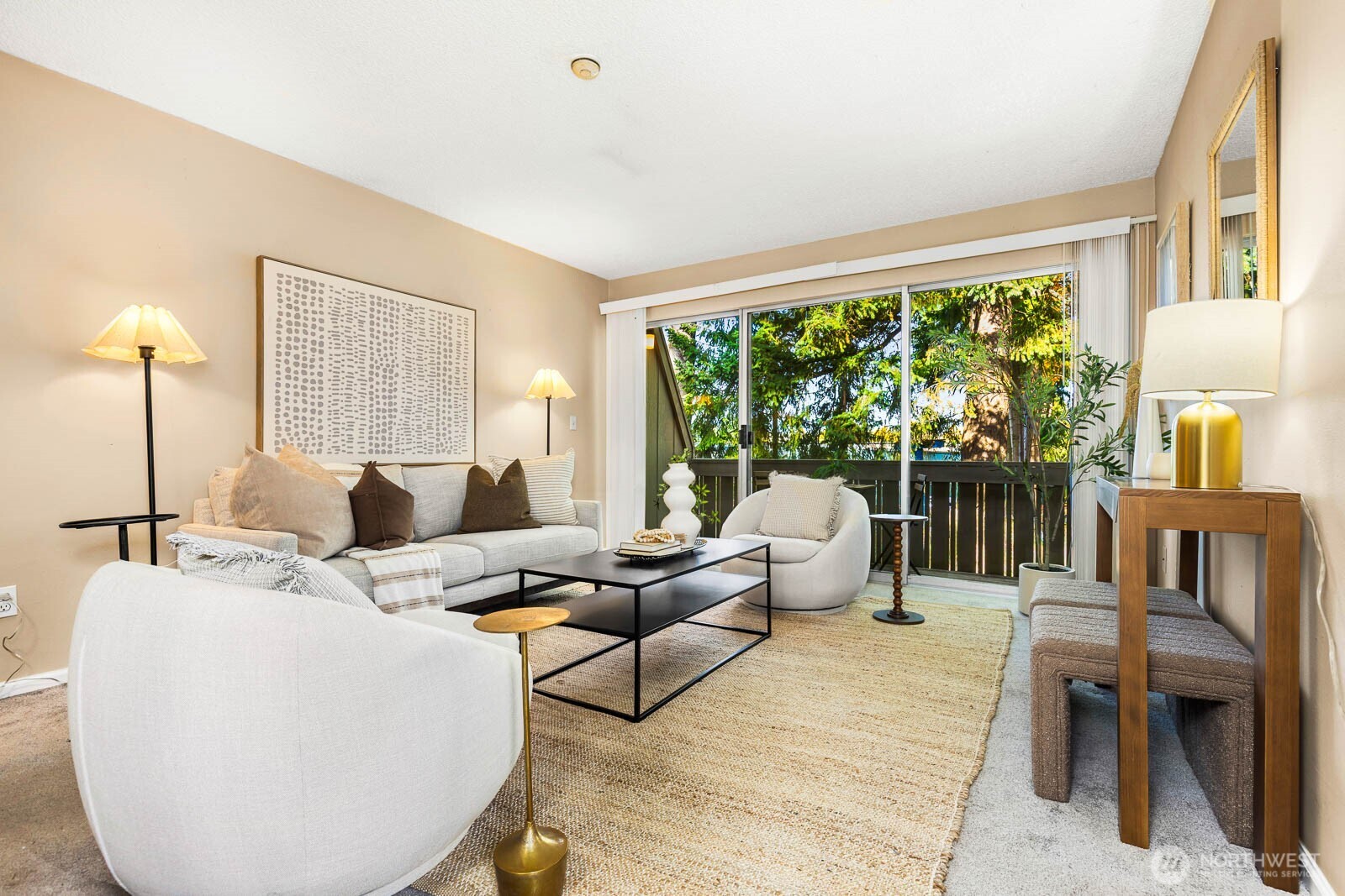4823 180th Street Southwest, Unit H203 Lynnwood, WA 98037 - Photo 11 of 26 a living room with furniture and a large window