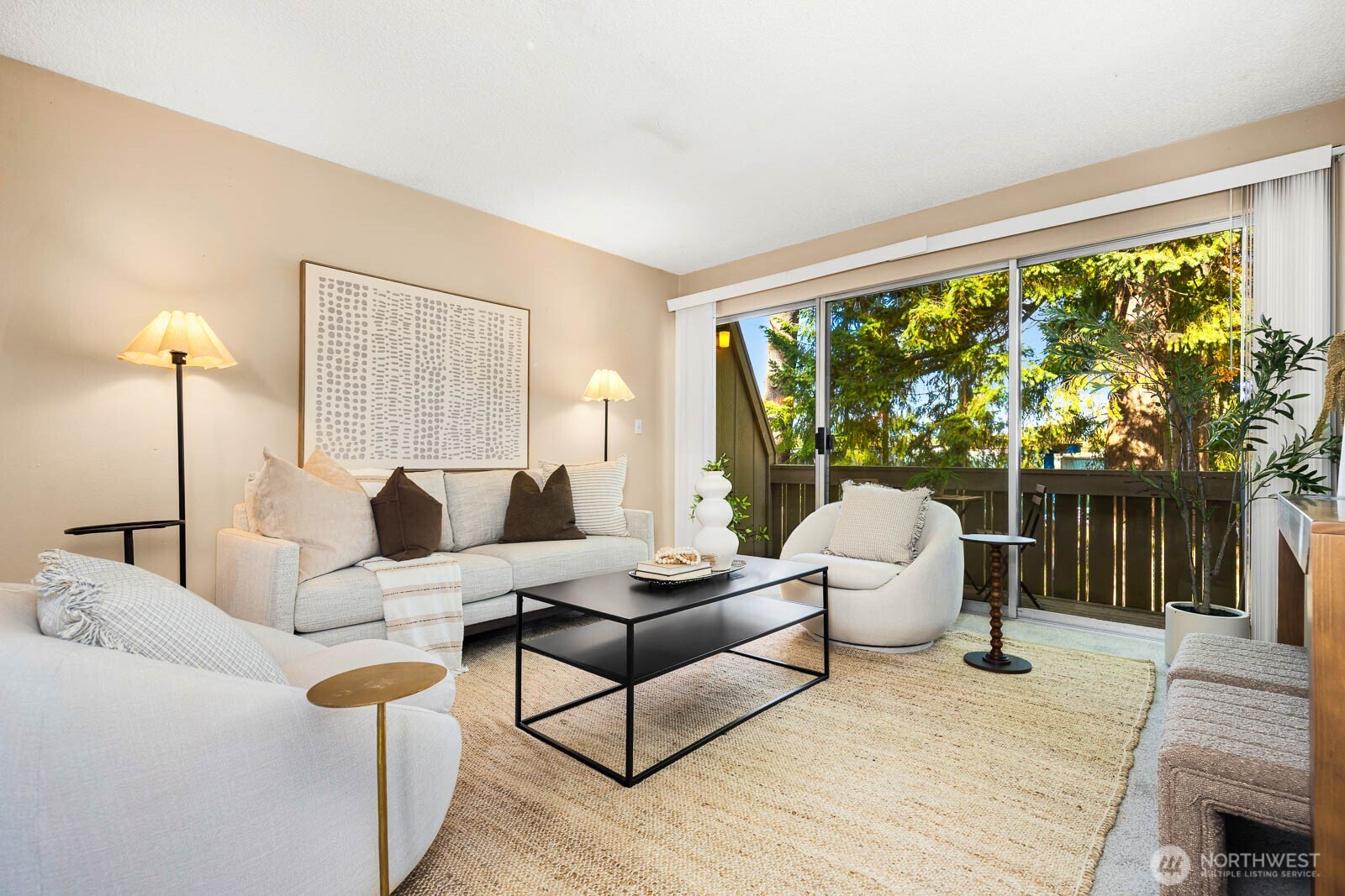 4823 180th Street Southwest, Unit H203 Lynnwood, WA 98037 - Photo 12 of 26 a living room with furniture and a large window