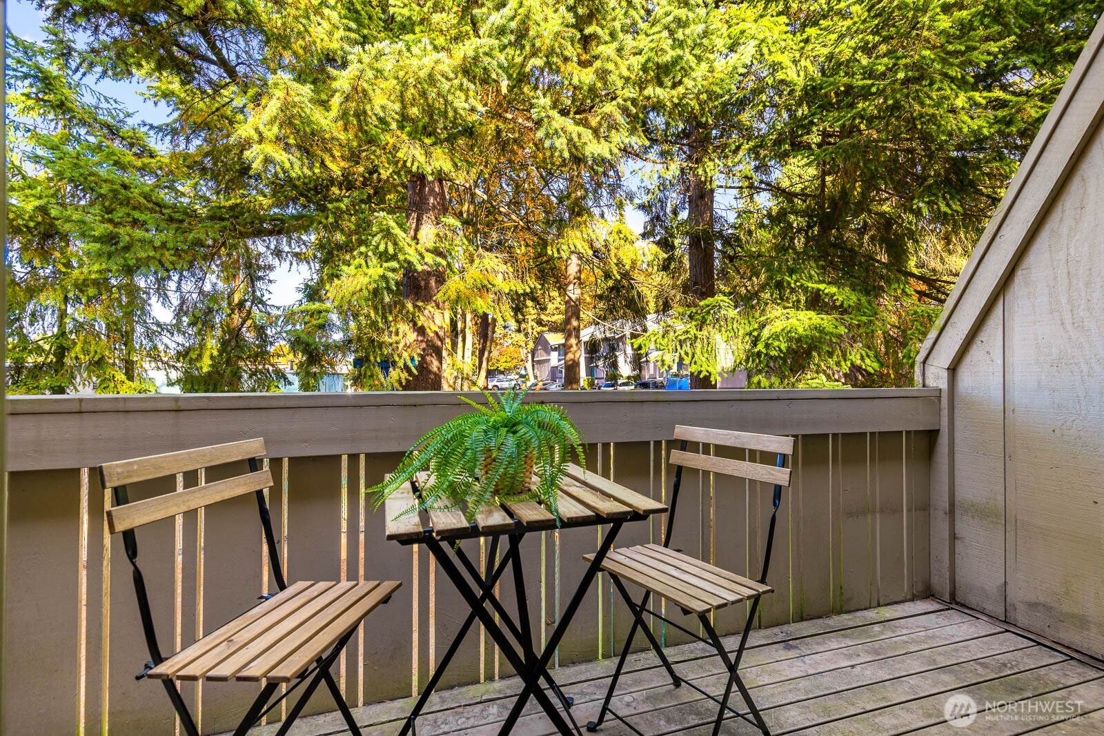 4823 180th Street Southwest, Unit H203 Lynnwood, WA 98037 - Photo 20 of 26 a view of chair and table in the balcony