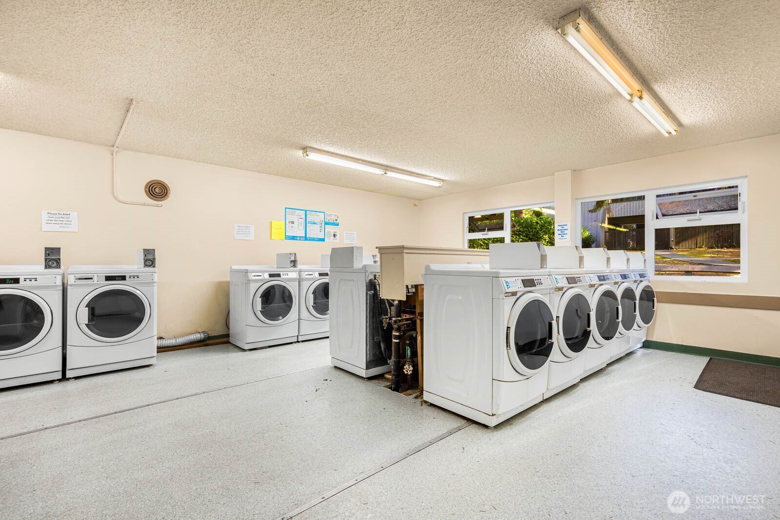 4823 180th Street Southwest, Unit H203 Lynnwood, WA 98037 - Photo 23 of 26 a utility room with dryer and washer