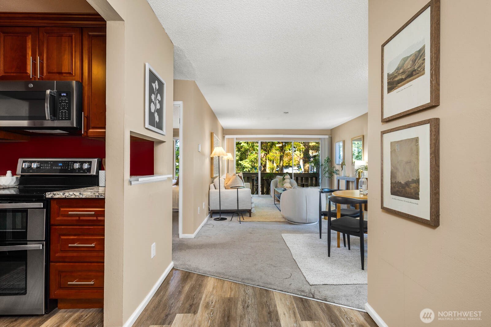 4823 180th Street Southwest, Unit H203 Lynnwood, WA 98037 - Photo 5 of 26 a dining room with furniture and a window