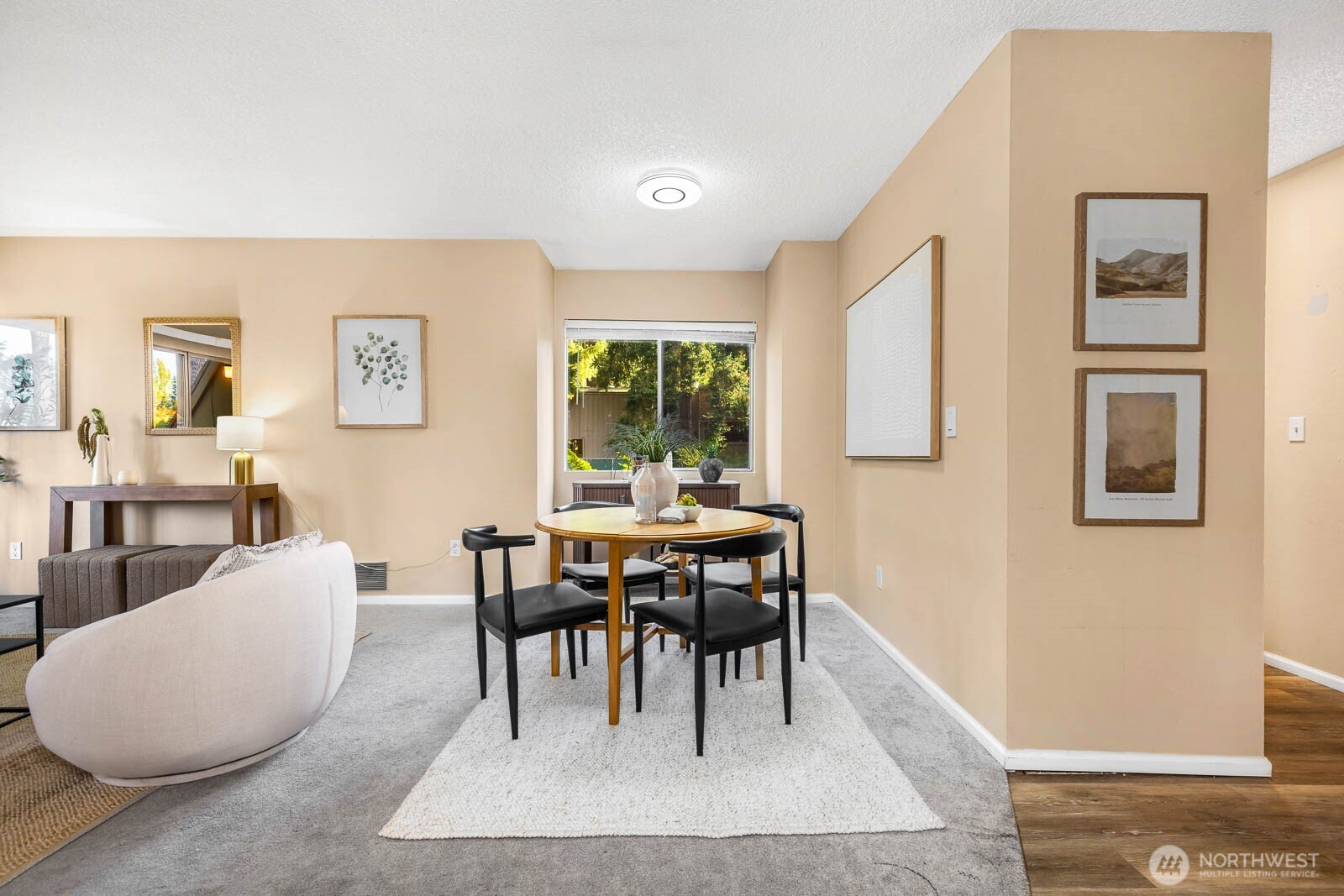 4823 180th Street Southwest, Unit H203 Lynnwood, WA 98037 - Photo 6 of 26 a view of a dining room with furniture