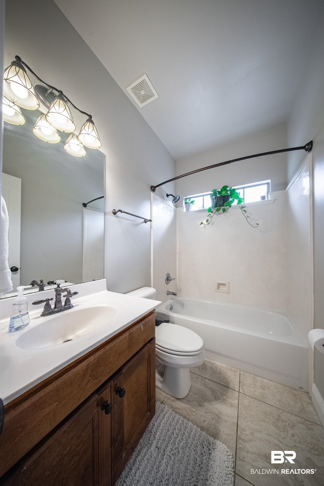8421 Weatherford Court Daphne, AL 36527 - Photo 22 of 36 Full bath with tub / shower combination and vanity