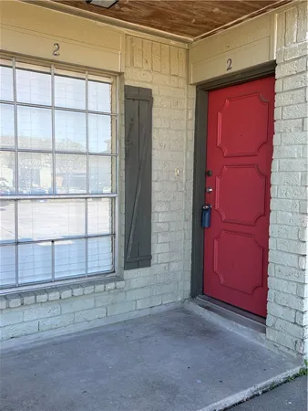 a view of a red door of the house