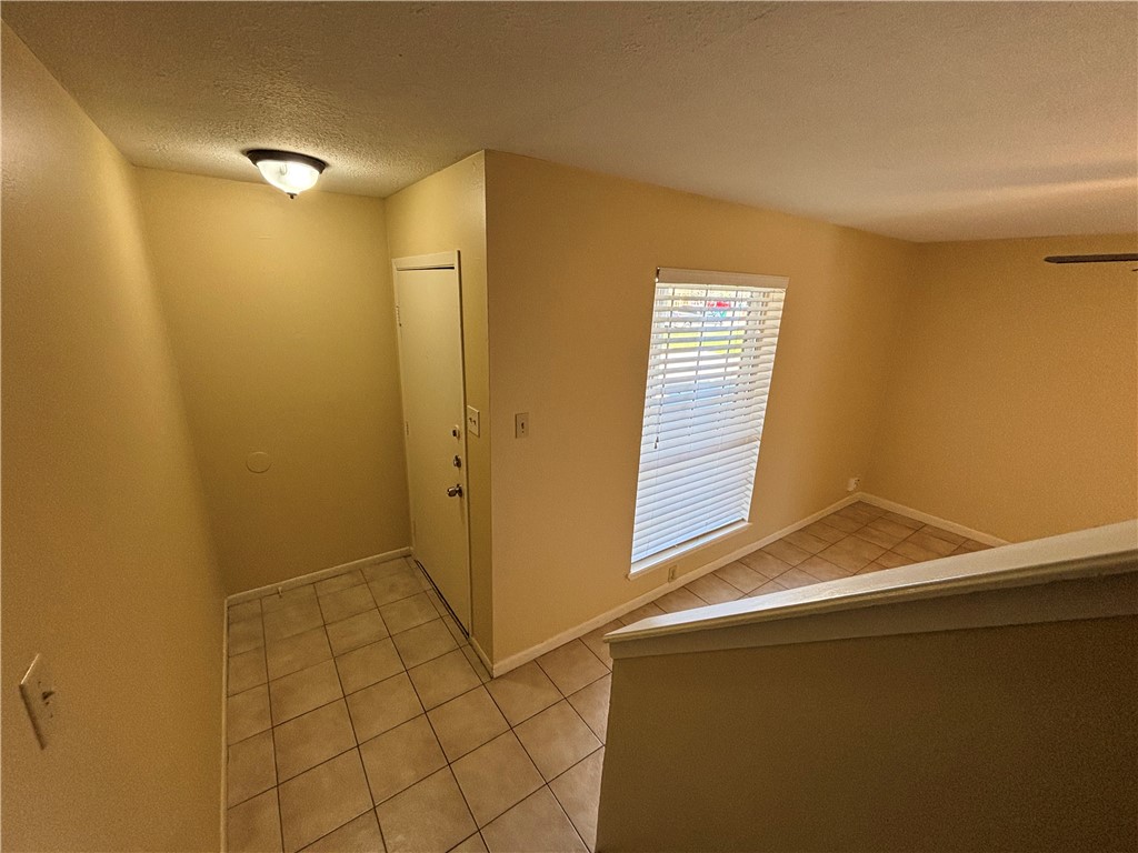 7214 Owen Court, Unit 2 Corpus Christi, TX 78413 - Photo 16 of 18 a bathroom with a sink and a shower
