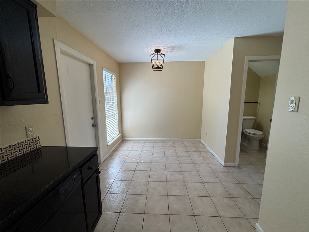 7214 Owen Court, Unit 2 Corpus Christi, TX 78413 - Photo 10 of 18 a view of a utility room with a sink