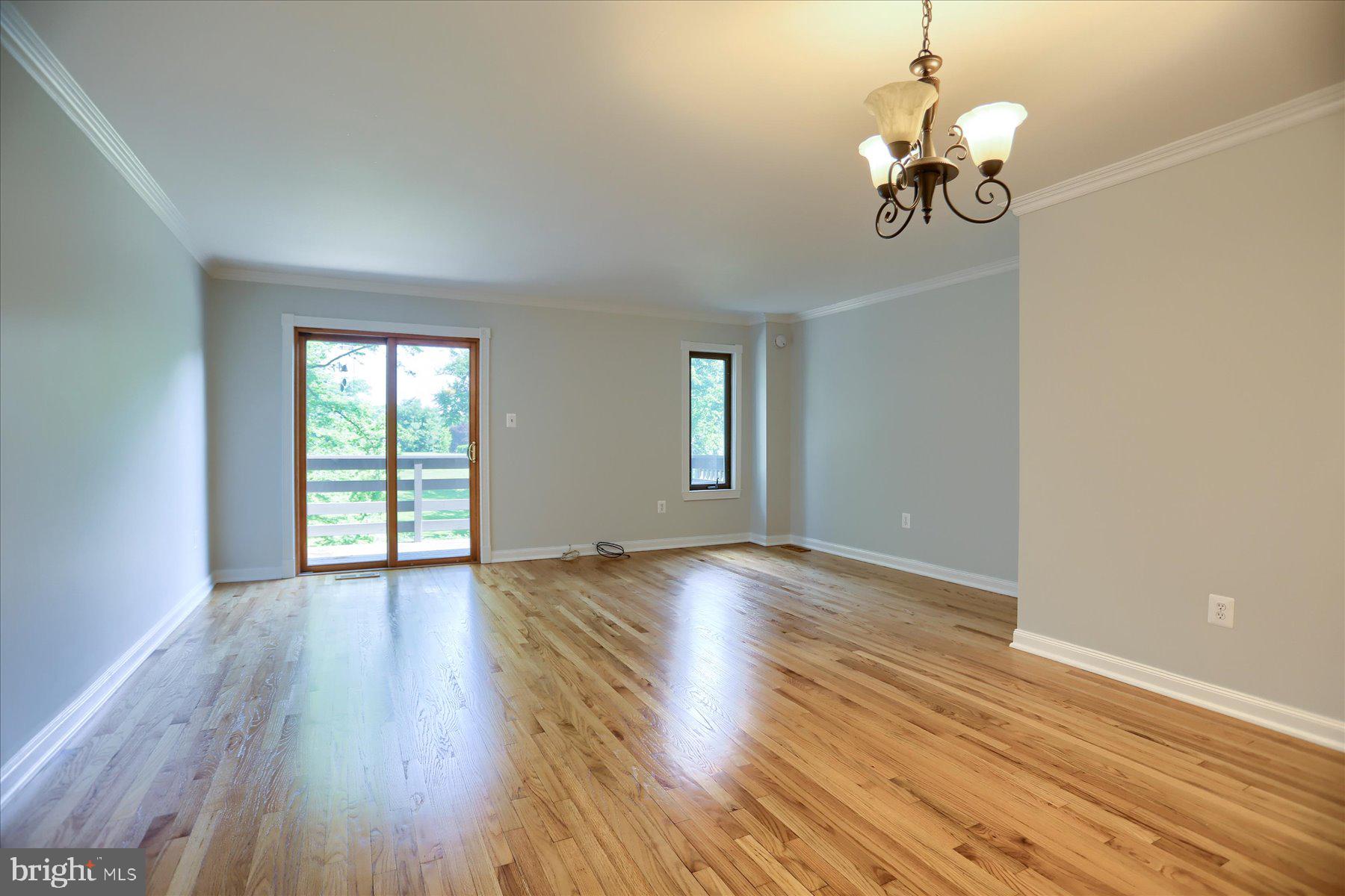 20 Stone Ridge Court, Unit 22 Baltimore, MD 21239 - Photo 5 of 37 View of Living Room from Dining