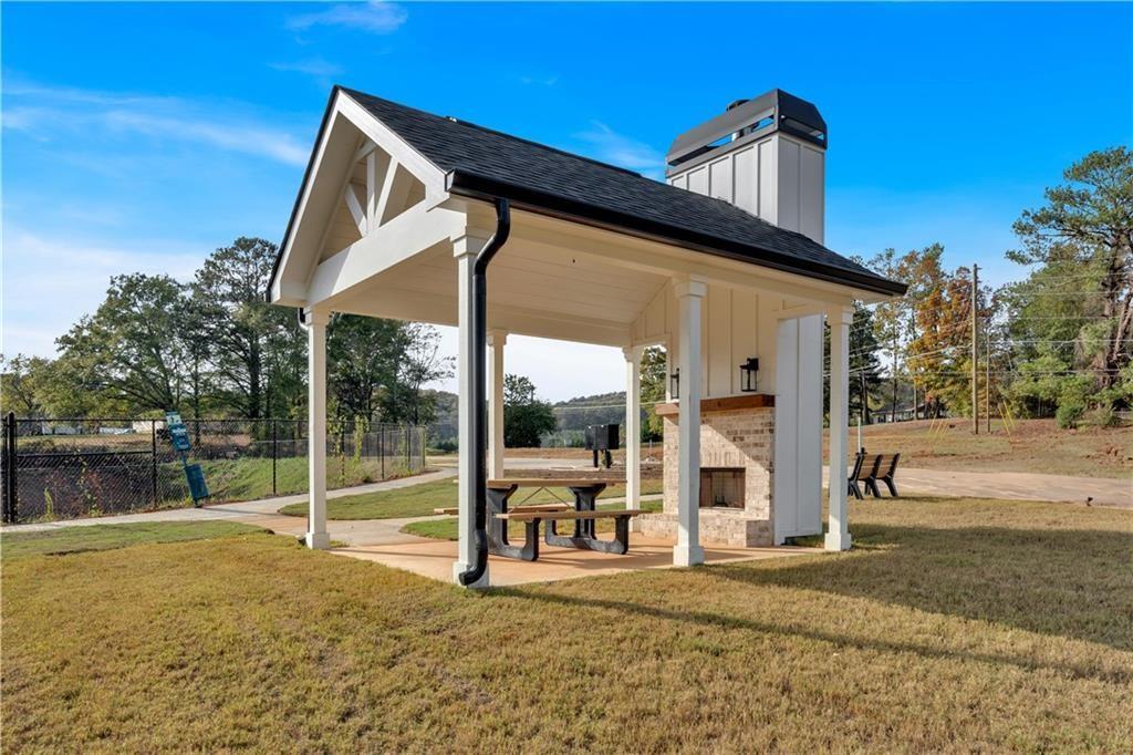44 Puckett Road Emerson, GA 30137 - Photo 37 of 39 a view of a house with a backyard