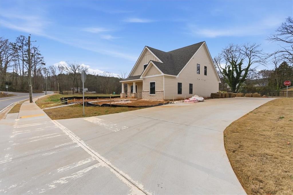 44 Puckett Road Emerson, GA 30137 - Photo 5 of 39 a view of outdoor space yard and front view of a house