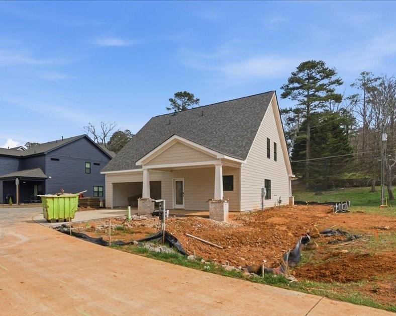44 Puckett Road Emerson, GA 30137 - Photo 6 of 39 a front view of a house with a yard