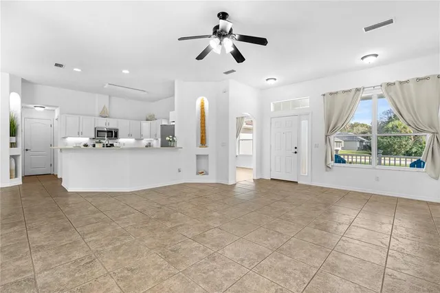 a view of kitchen with furniture and window