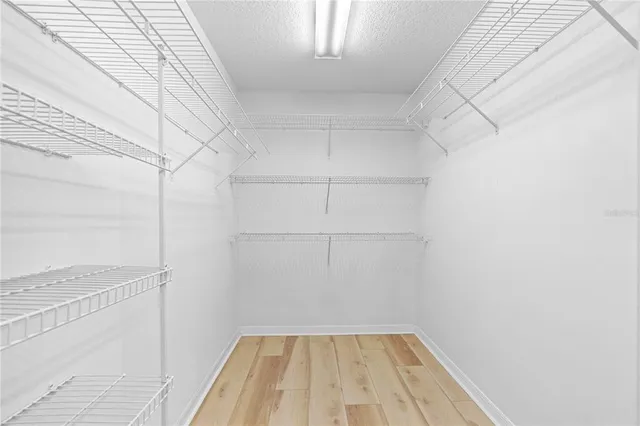 a view of a room with racks on the wall