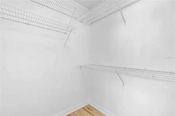 a view of a room with racks on the wall