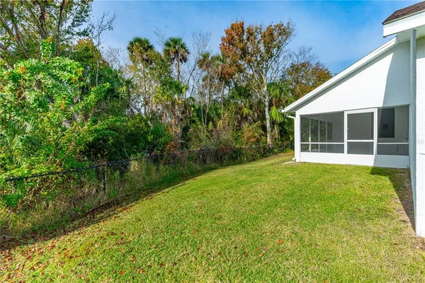 a view of backyard with green space