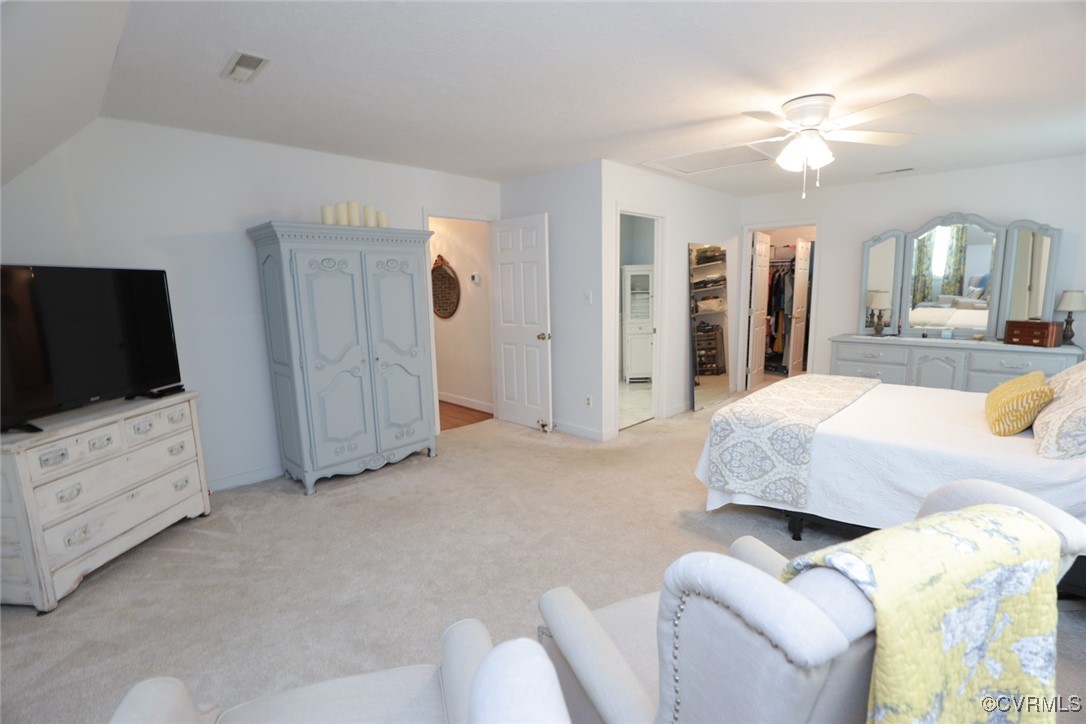 18300 River Road Chesterfield, VA 23838 - Photo 30 of 48 a spacious bedroom with a bed and a flat screen tv