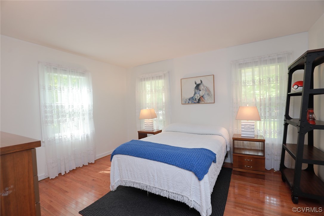 18300 River Road Chesterfield, VA 23838 - Photo 39 of 48 a bedroom with a bed and a book shelf