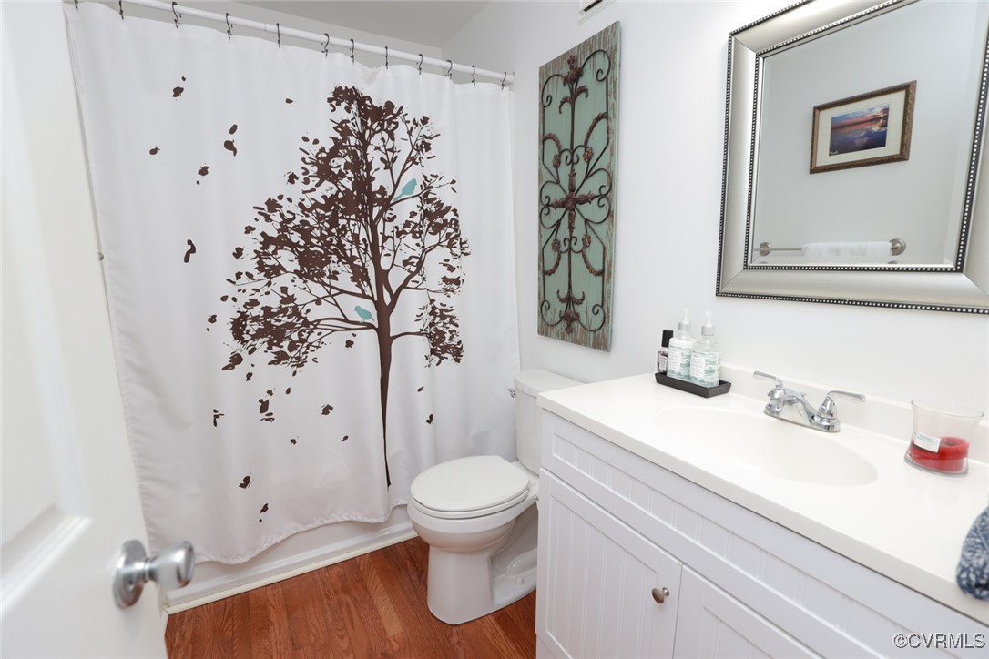 18300 River Road Chesterfield, VA 23838 - Photo 40 of 48 a bathroom with a toilet sink and mirror