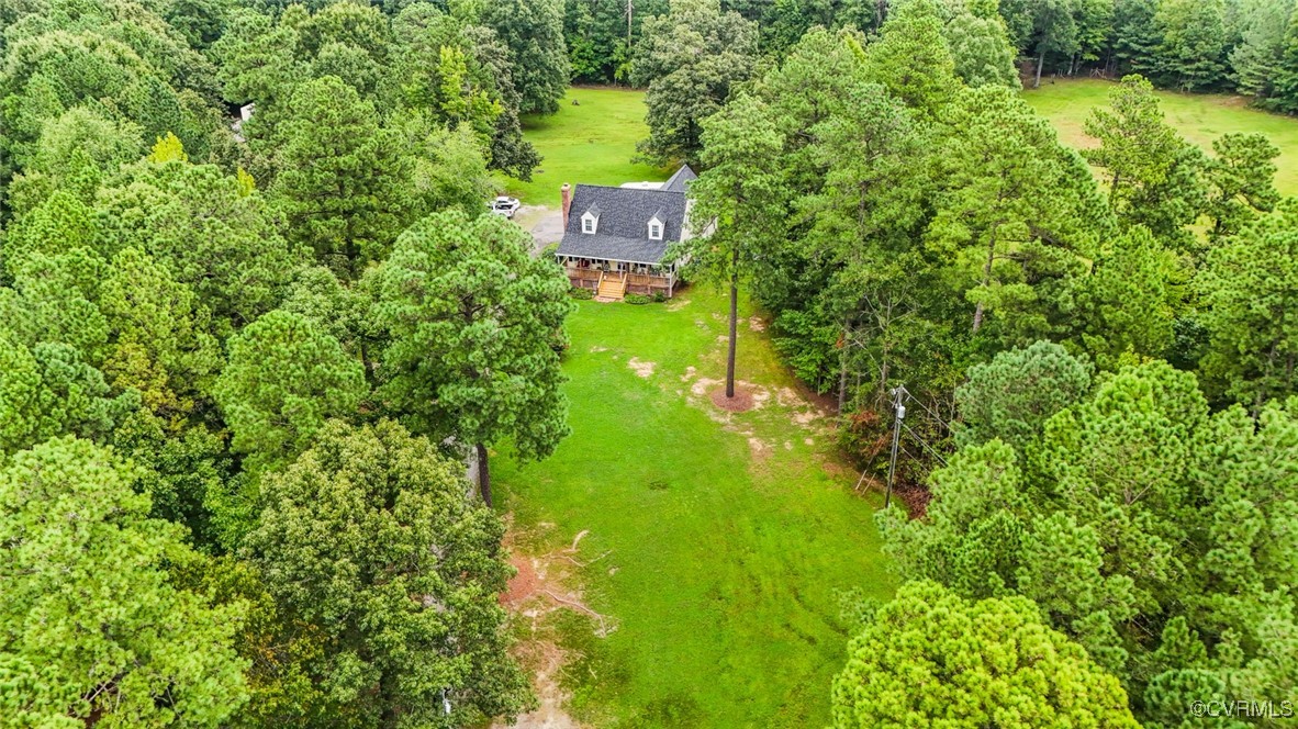 18300 River Road Chesterfield, VA 23838 - Photo 7 of 48 a view of a back yard from a garden