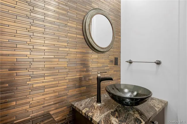 a bathroom with a toilet and a sink