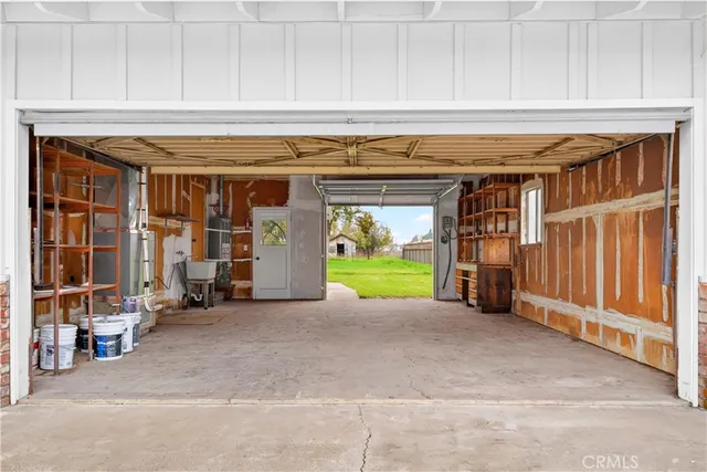 a view of an front door and cabinet
