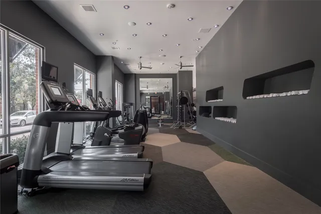 a view of lobby with gym equipment