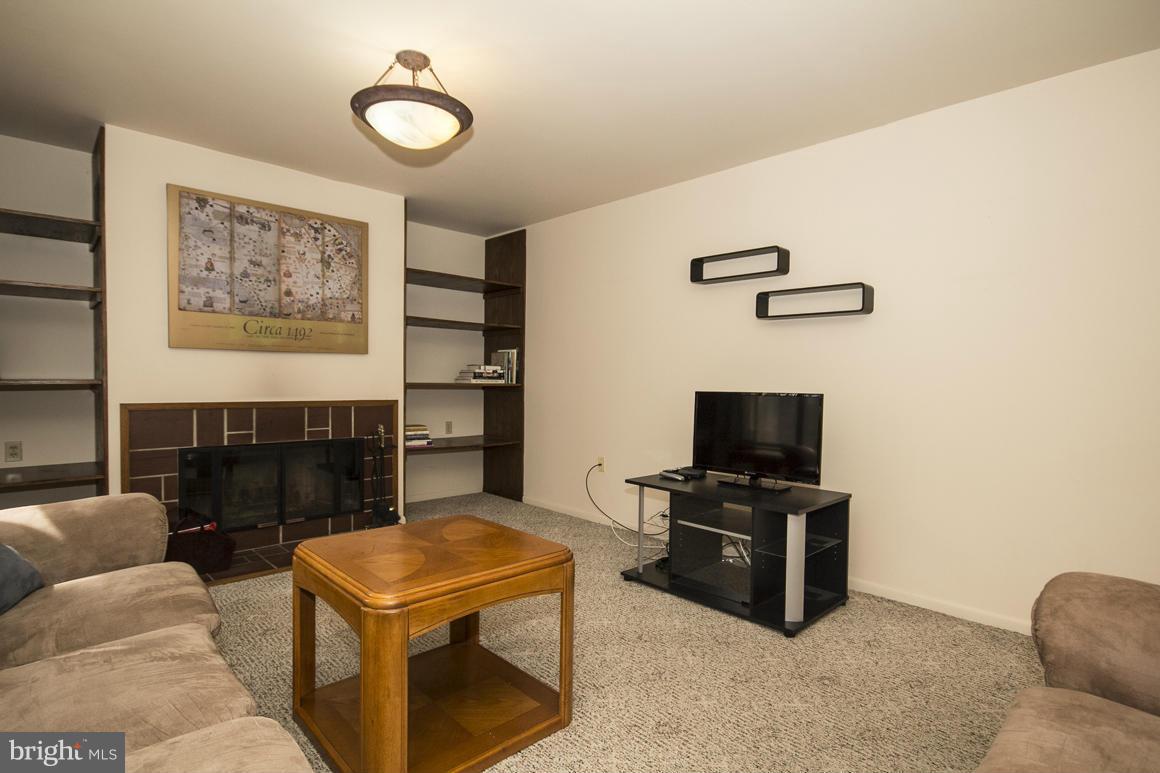 9529 White Spring Way Columbia, MD 21046 - Photo 13 of 30 Family Room with built in bookshelves