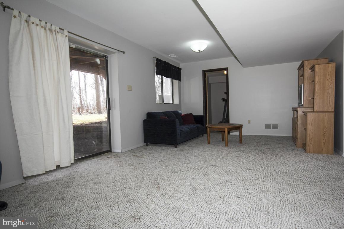 9529 White Spring Way Columbia, MD 21046 - Photo 21 of 30 Rec room with slider to back yard