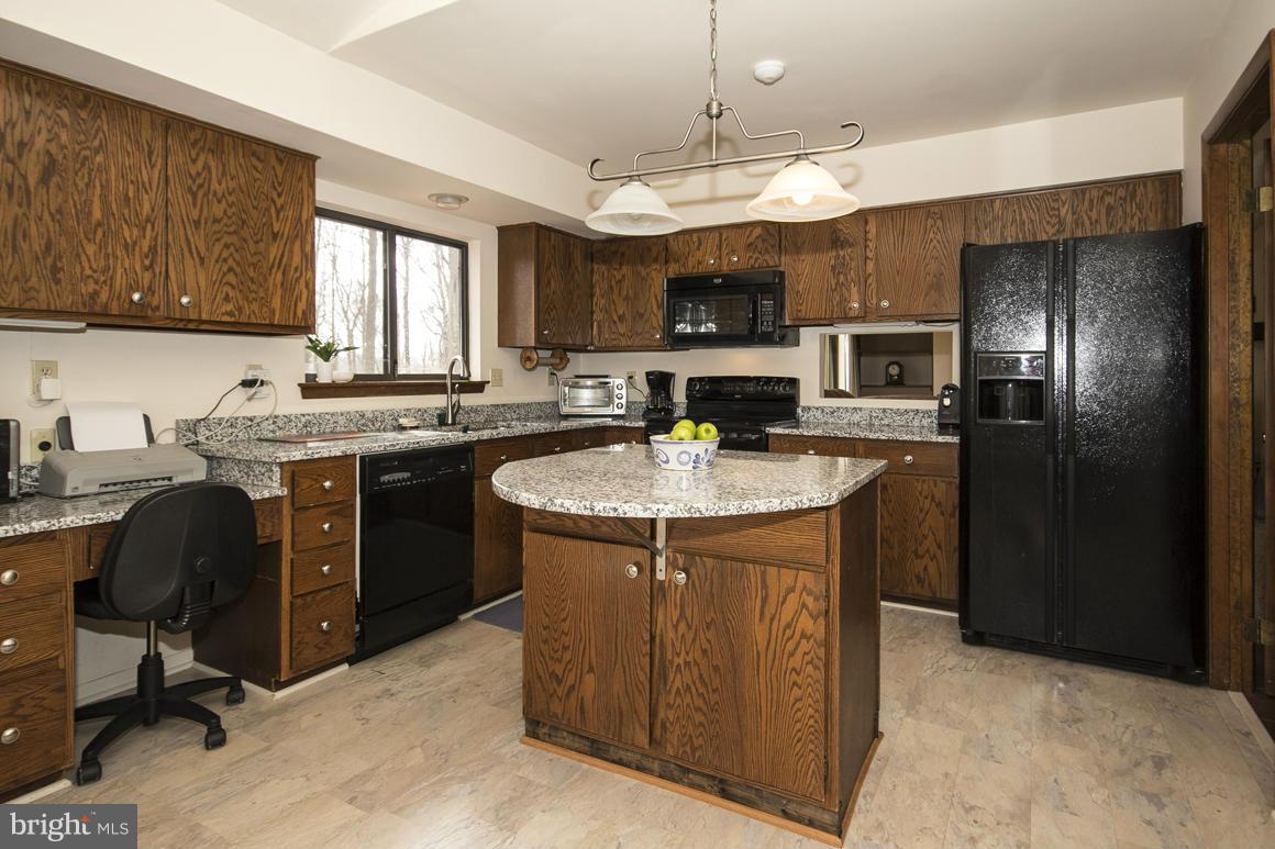 9529 White Spring Way Columbia, MD 21046 - Photo 7 of 30 Kitchen with granite counters, newer appliances