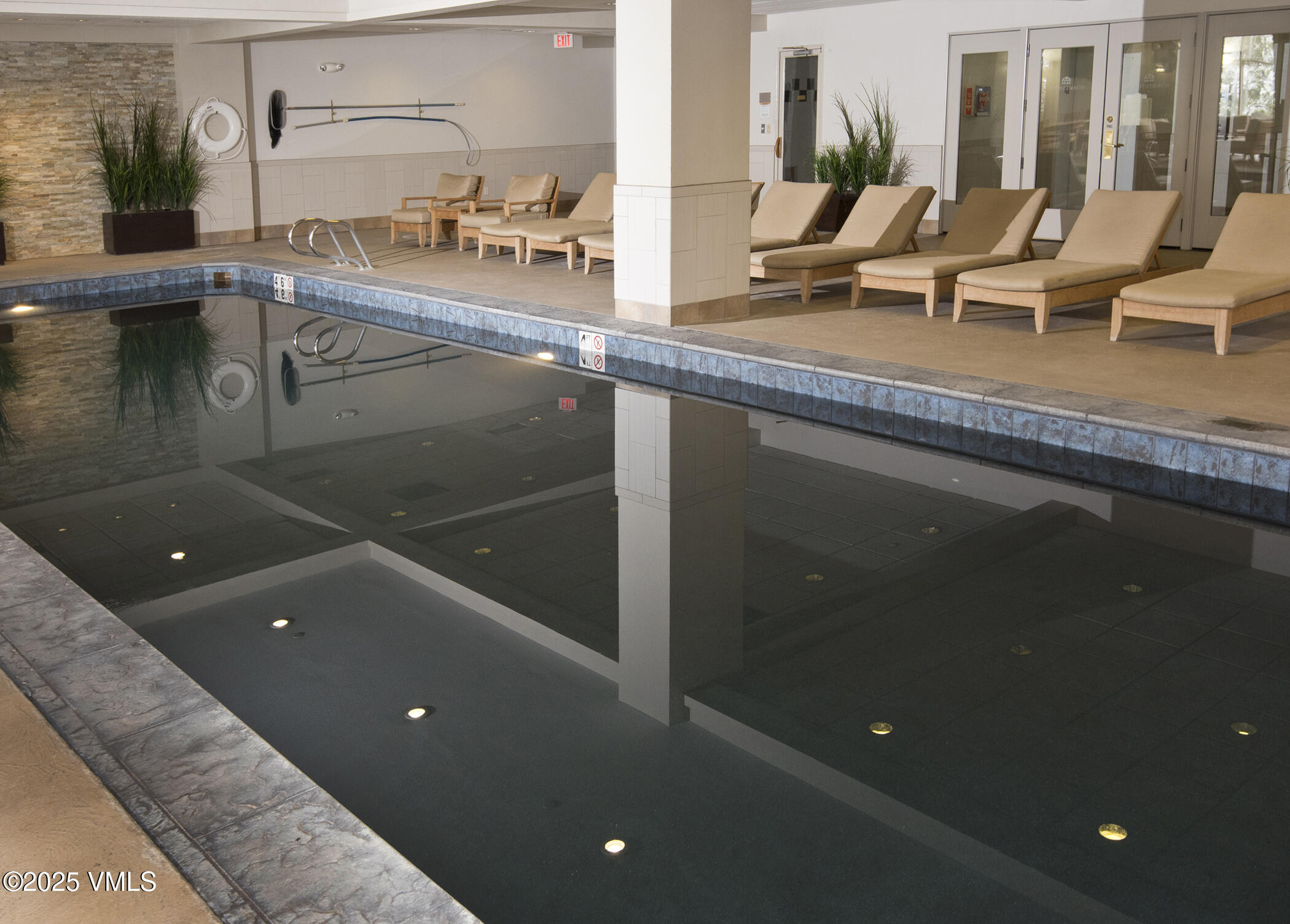 210 Offerson Road, Unit 21026 Beaver Creek, CO 81620 - Photo 11 of 12 a kitchen with counter top space and two windows