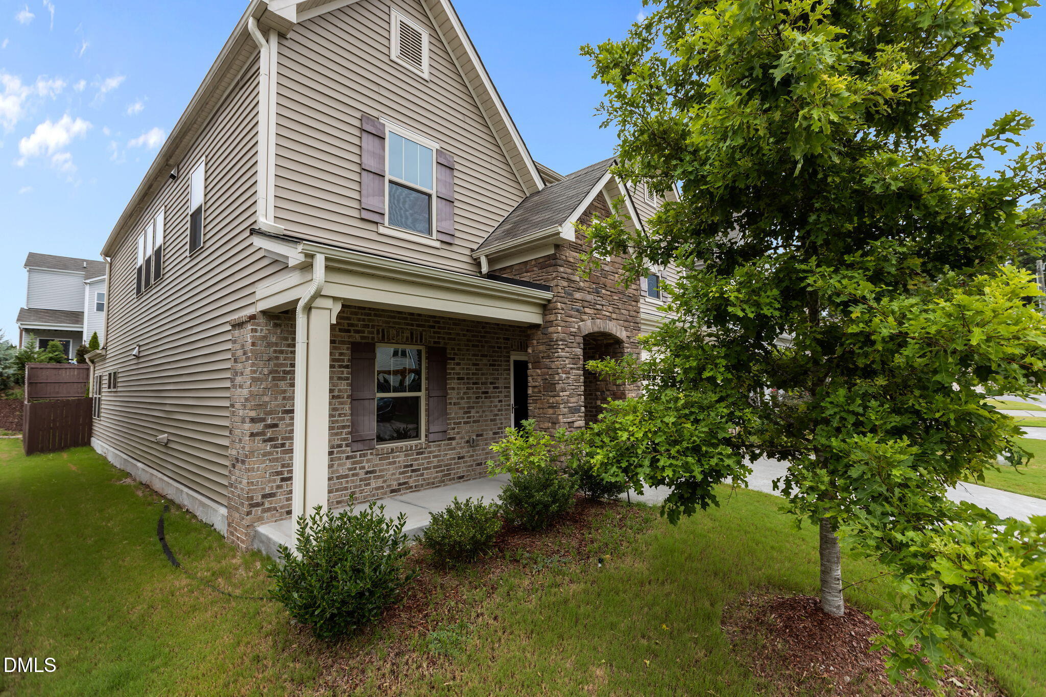 1027 Janiskee Road Durham, NC 27703 - Photo 3 of 36 a front view of a house with plants