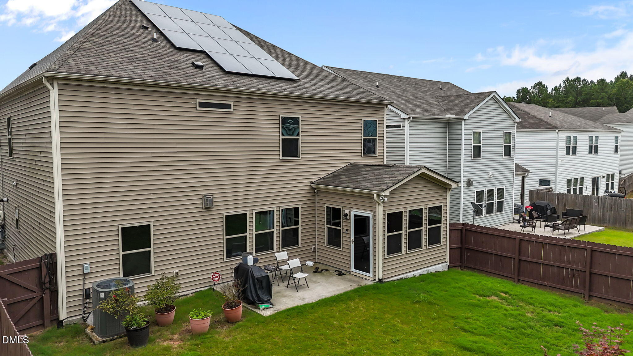1027 Janiskee Road Durham, NC 27703 - Photo 32 of 36 a view of house with a yard