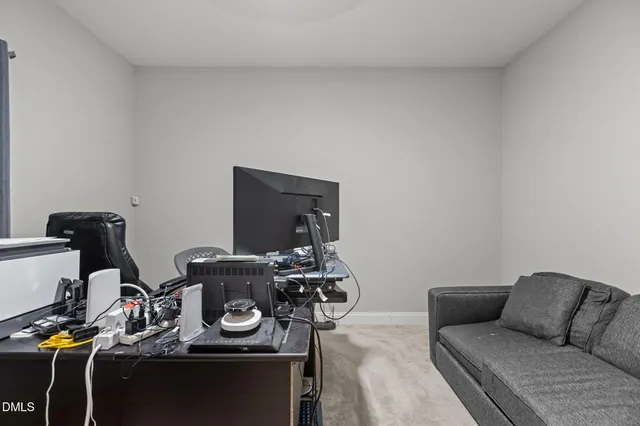 a living room with furniture and furniture