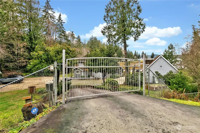 a view of a wrought iron fences in front of house