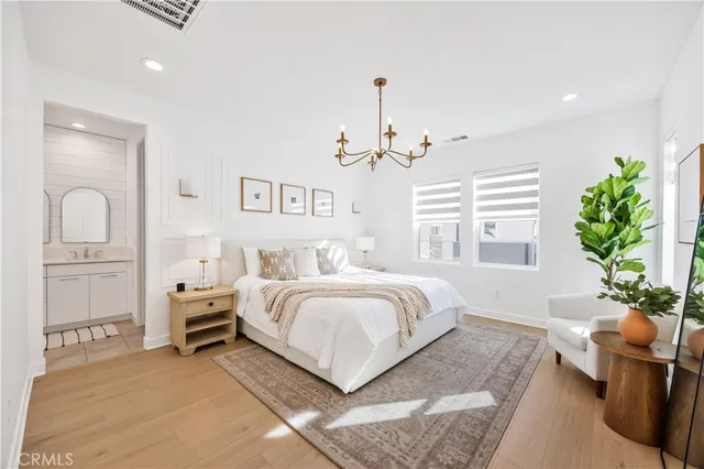 a living room with a bed furniture and a window