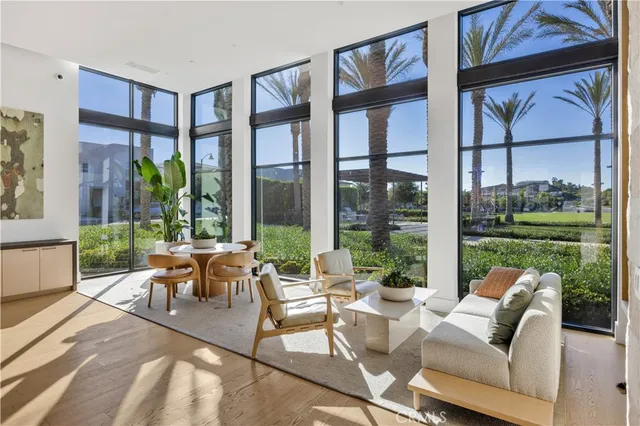 a bed room with a bed and a large window