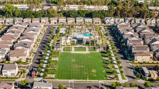 a view of a swimming pool with a table and chairs