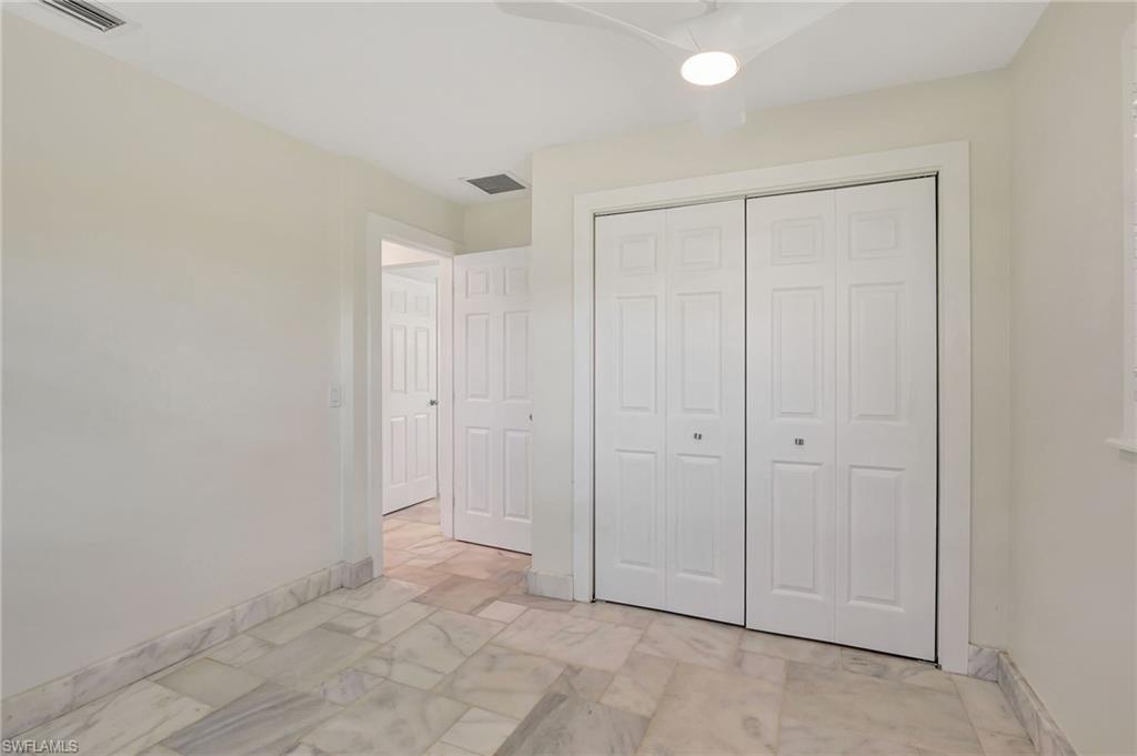 112 Capri Boulevard Naples, FL 34113 - Photo 20 of 39 a view of an empty room