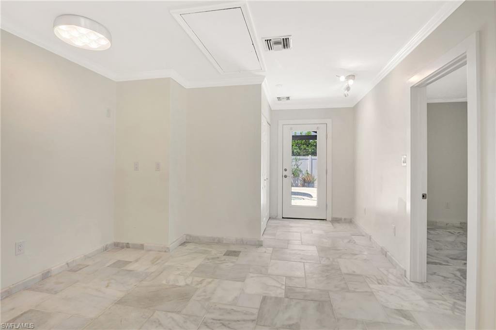 112 Capri Boulevard Naples, FL 34113 - Photo 26 of 39 a view of an empty room