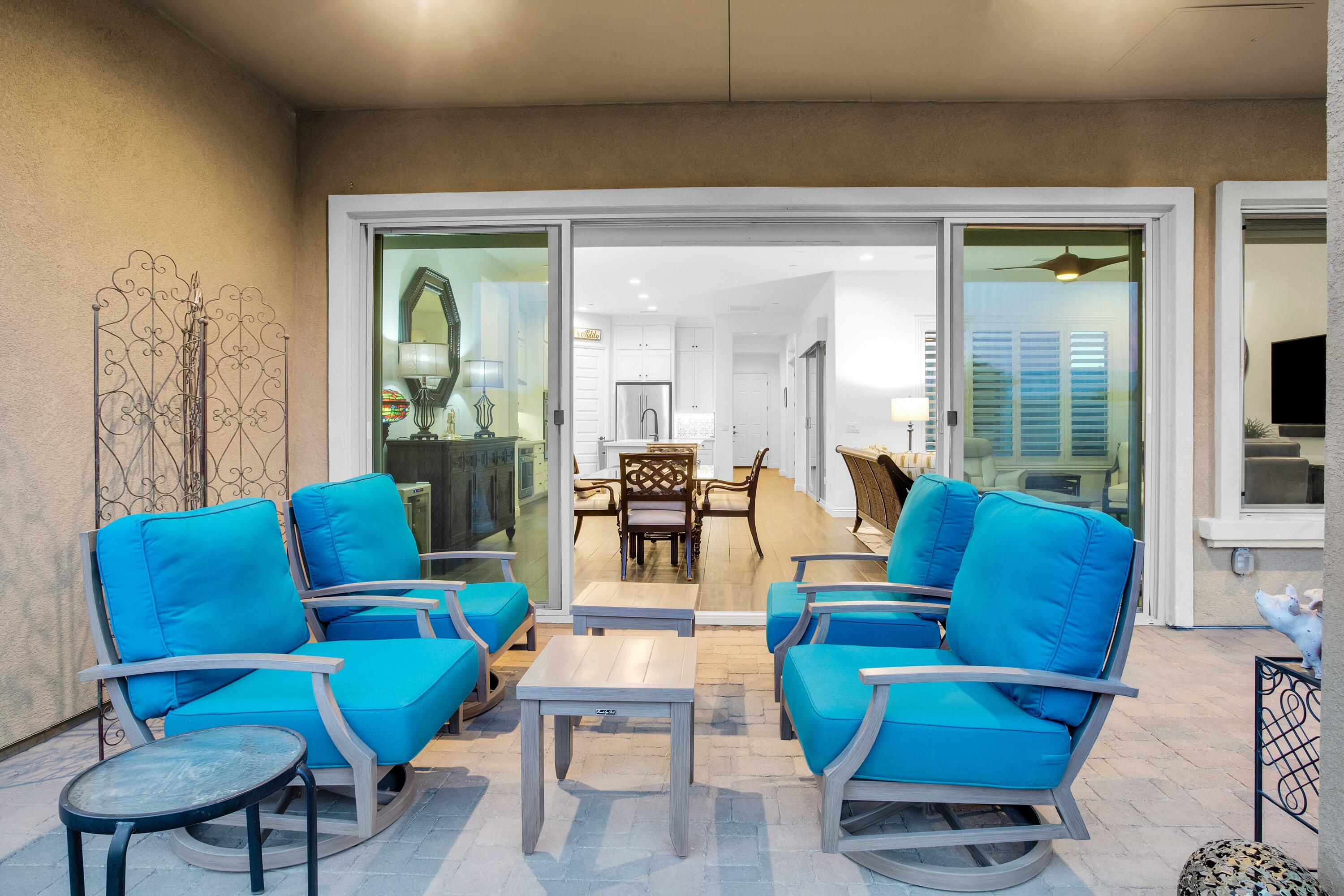 32 Cork Tree Rancho Mirage, CA 92270 - Photo 15 of 58 a living room with furniture and a potted plant