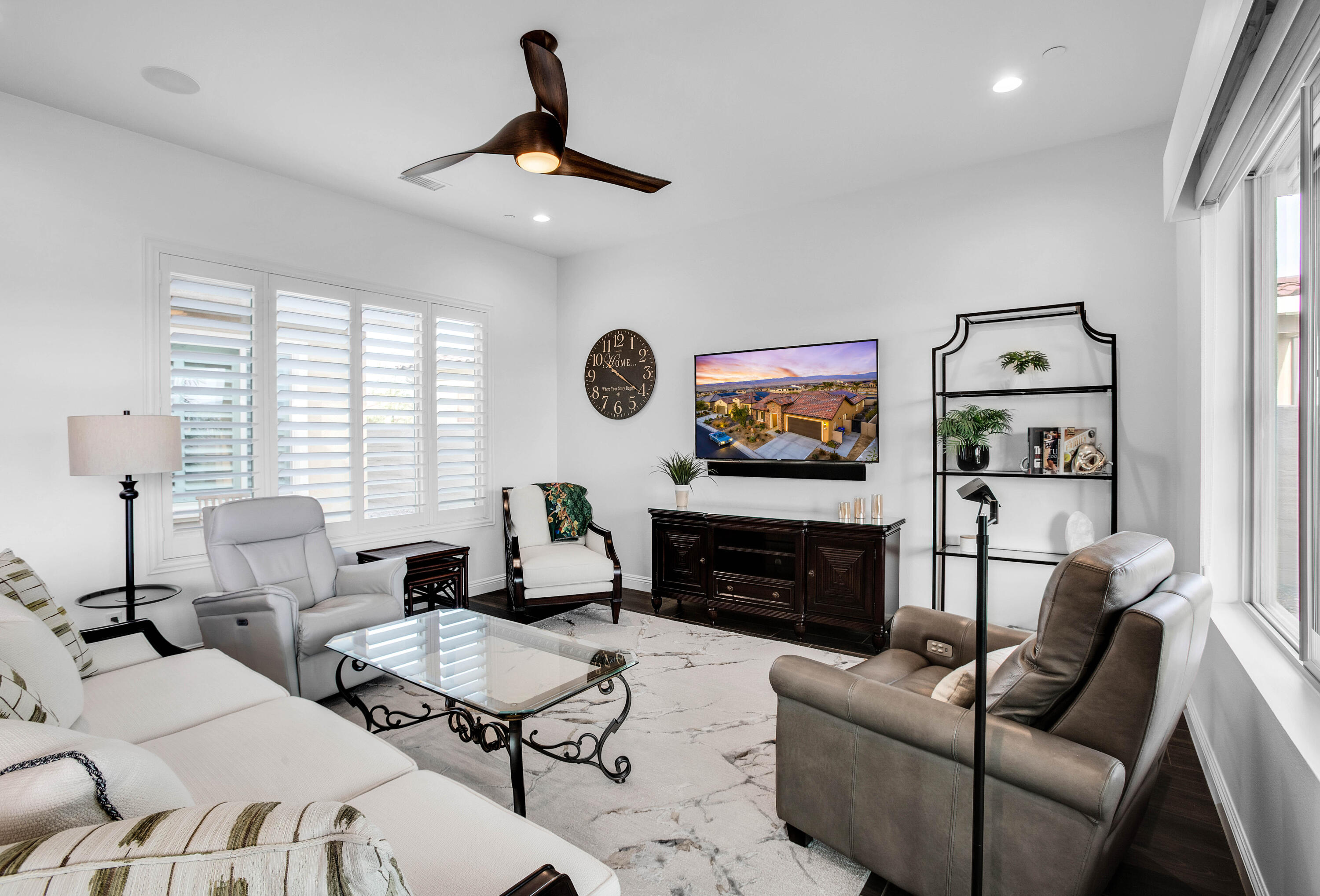 32 Cork Tree Rancho Mirage, CA 92270 - Photo 18 of 58 a living room with furniture a flat screen tv and a fireplace