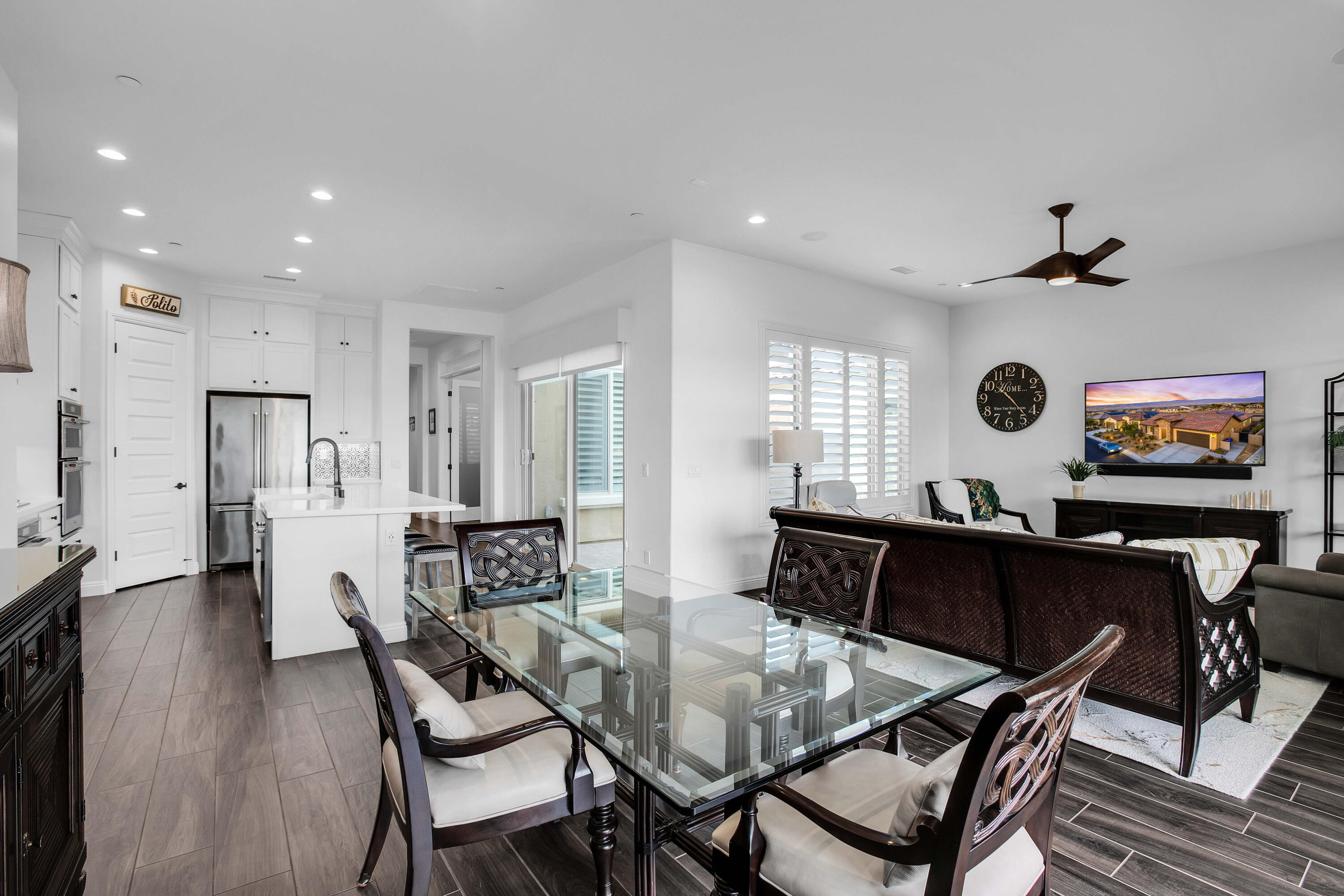32 Cork Tree Rancho Mirage, CA 92270 - Photo 20 of 58 a view of a dining room with furniture and wooden floor