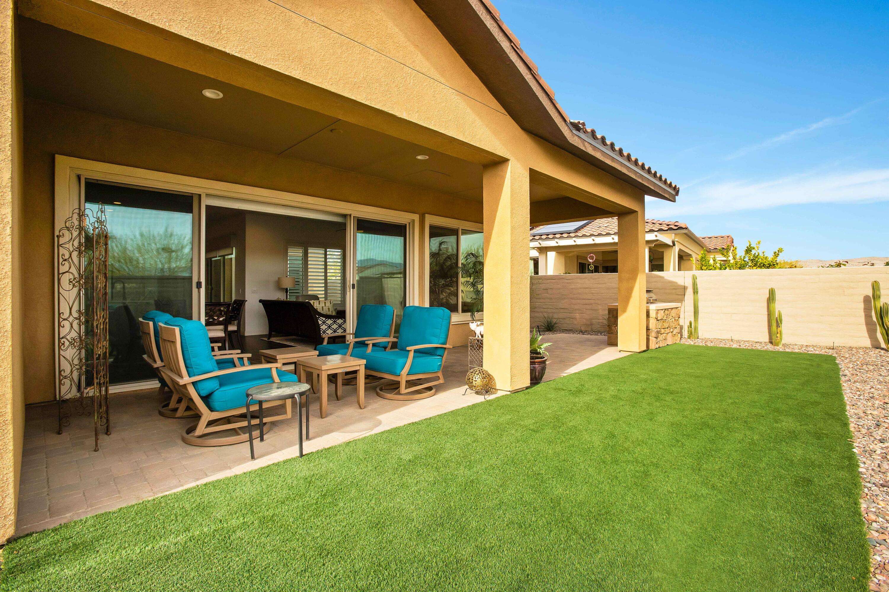 32 Cork Tree Rancho Mirage, CA 92270 - Photo 38 of 58 a view of a house with backyard porch and sitting area