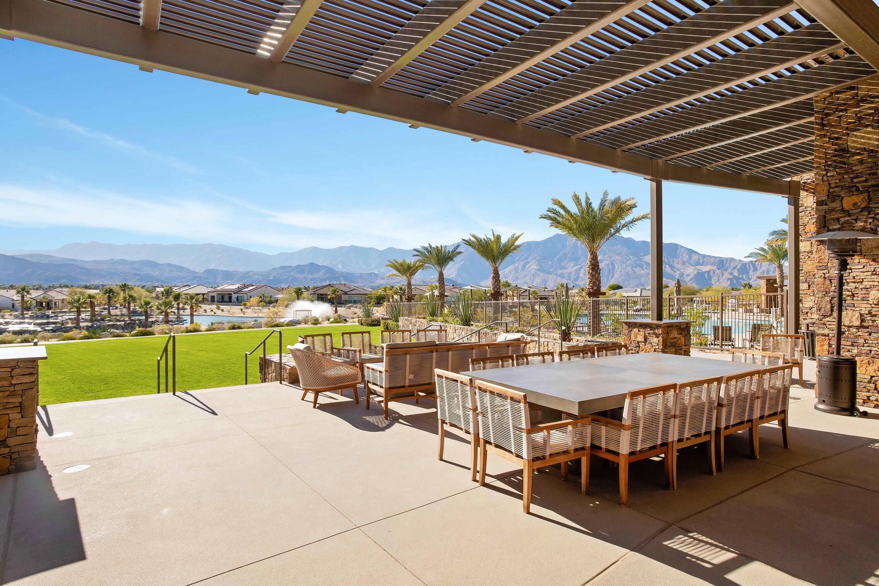 32 Cork Tree Rancho Mirage, CA 92270 - Photo 55 of 58 a view of a patio with a table and chairs