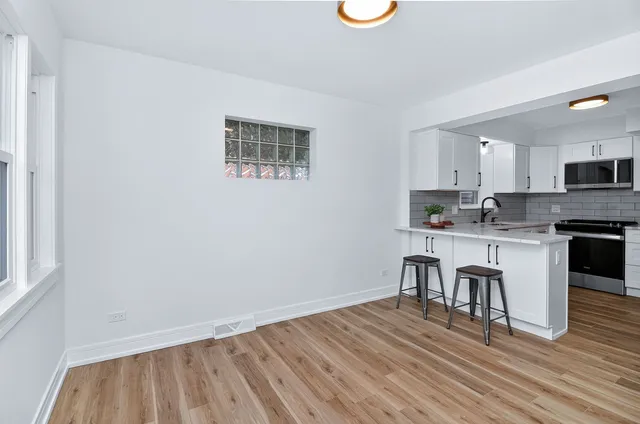 $520,000 | 7624 West Ainslie Street, Harwood Heights, IL 60706