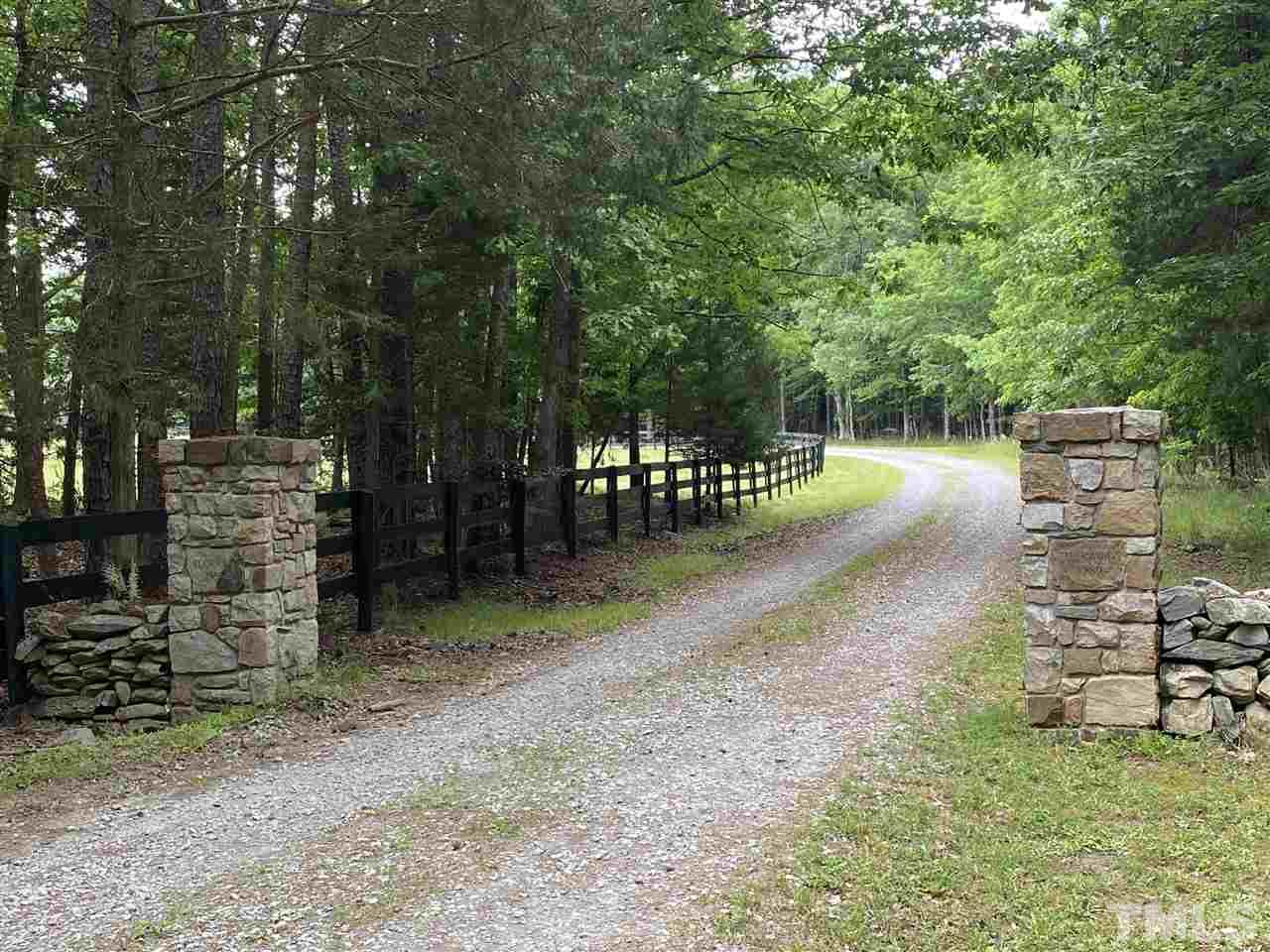 1816 Harris Road Rougemont, NC 27572 - Photo 10 of 12 a view of a park with large trees