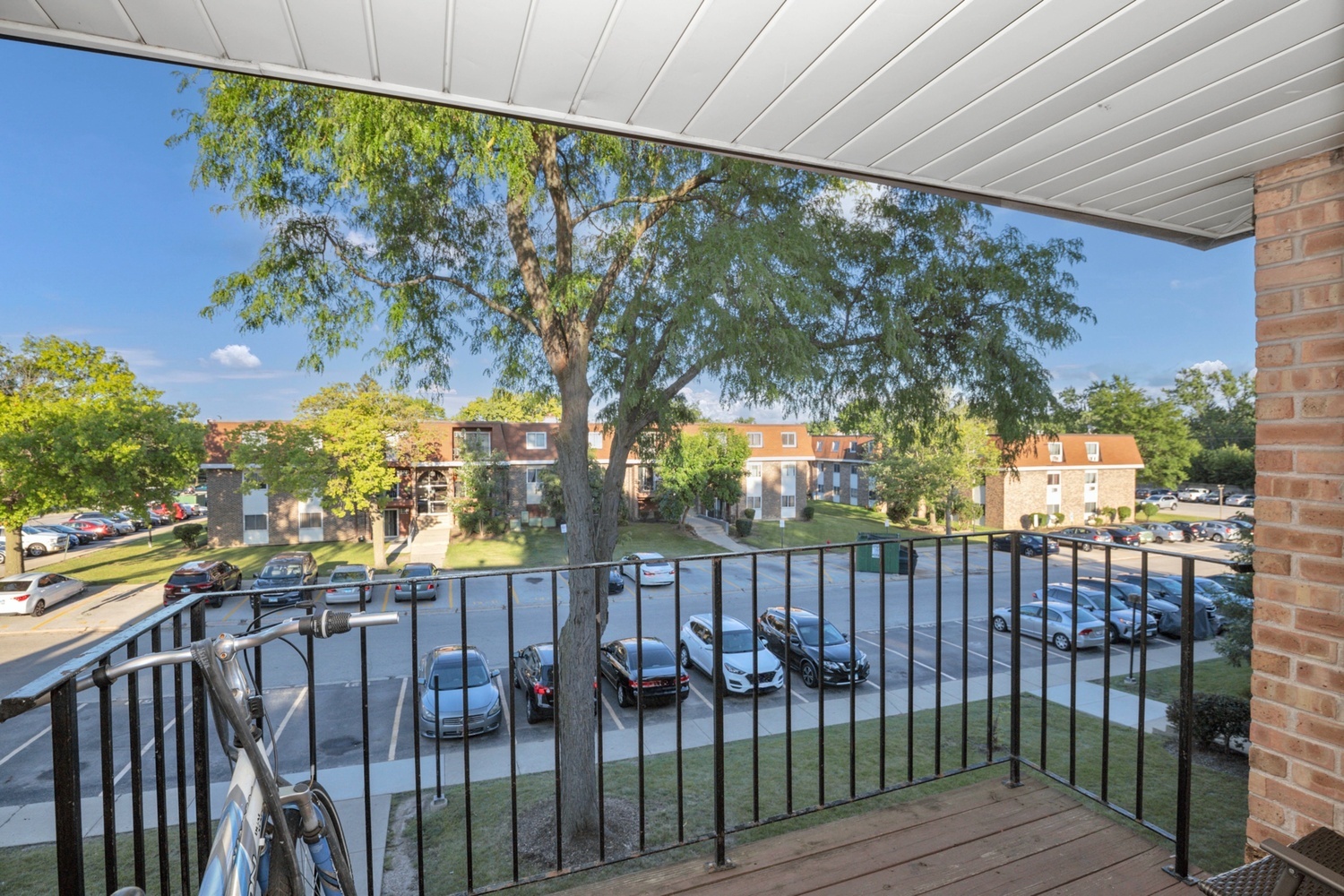 1080 Knoll Lane, Unit 305 Hoffman Estates, IL 60169 - Photo 3 of 10 a view of a wrought iron fences